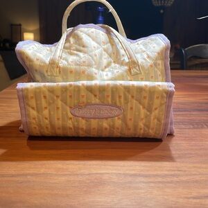 Bitty Baby (American Girl) diaper bag with shown items.